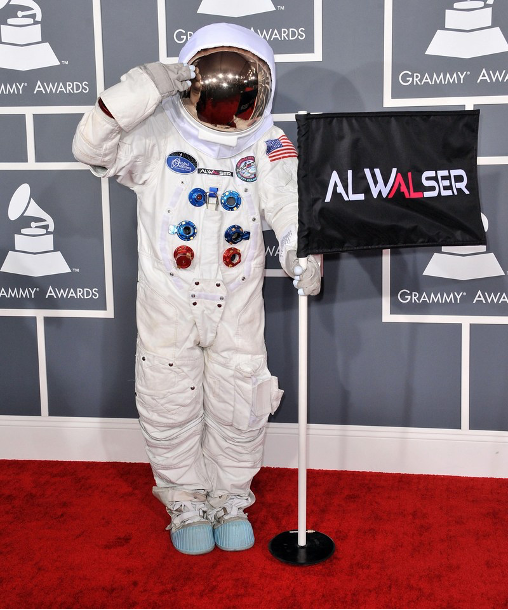 Al Walser posing with the flag at the Grammys